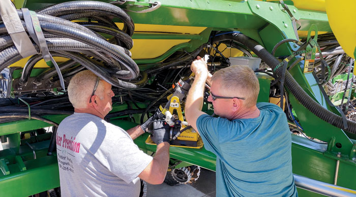 Chad-Baker-Fixing-Hose.jpg