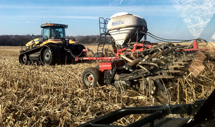 Kuhn-Krause-Gladiator-strip-till-bar-with-a-Montag-dry-fertilizer-tank.jpg