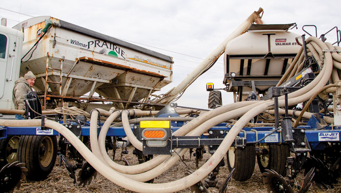 Hodnefield-refills-his-dry-fertilizer-tank.jpg